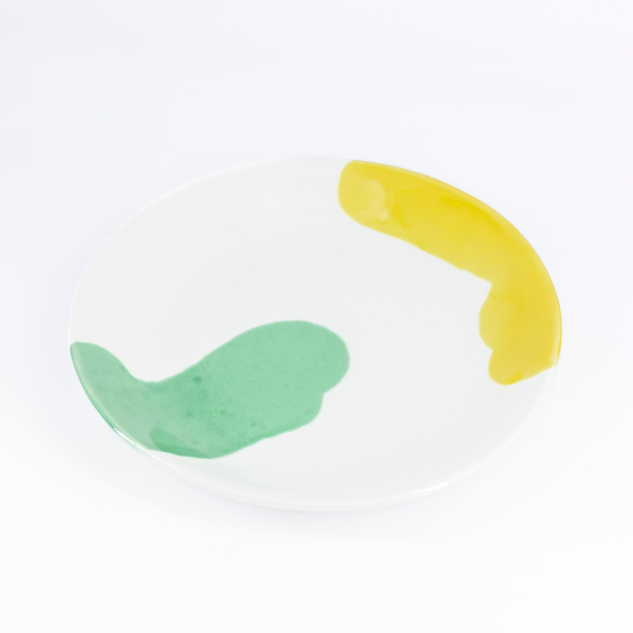古川章蔵作の陶磁器「二色流し丸皿:Yellow&Green」(写真2枚目)