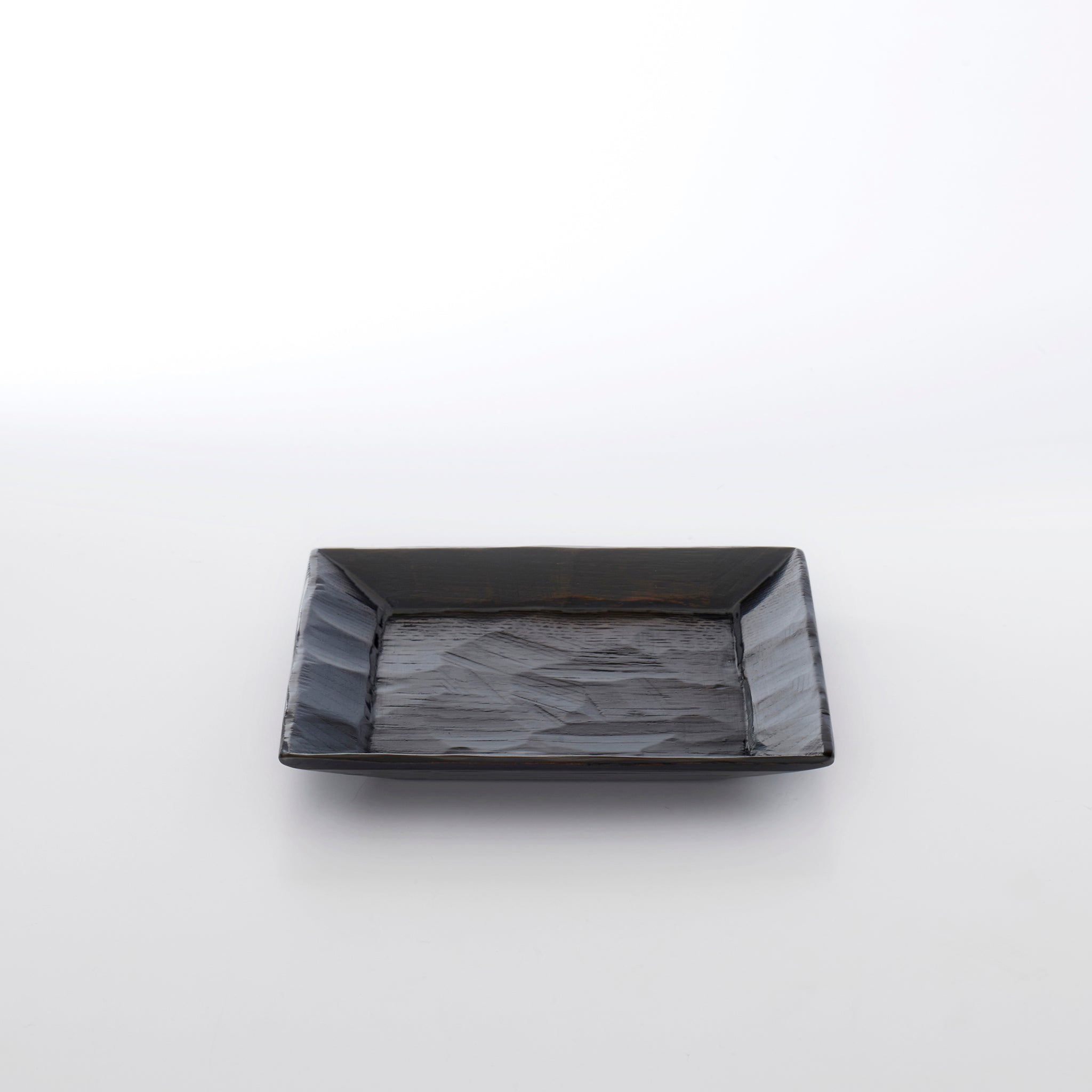 Hand-carved square plate, 5 inches