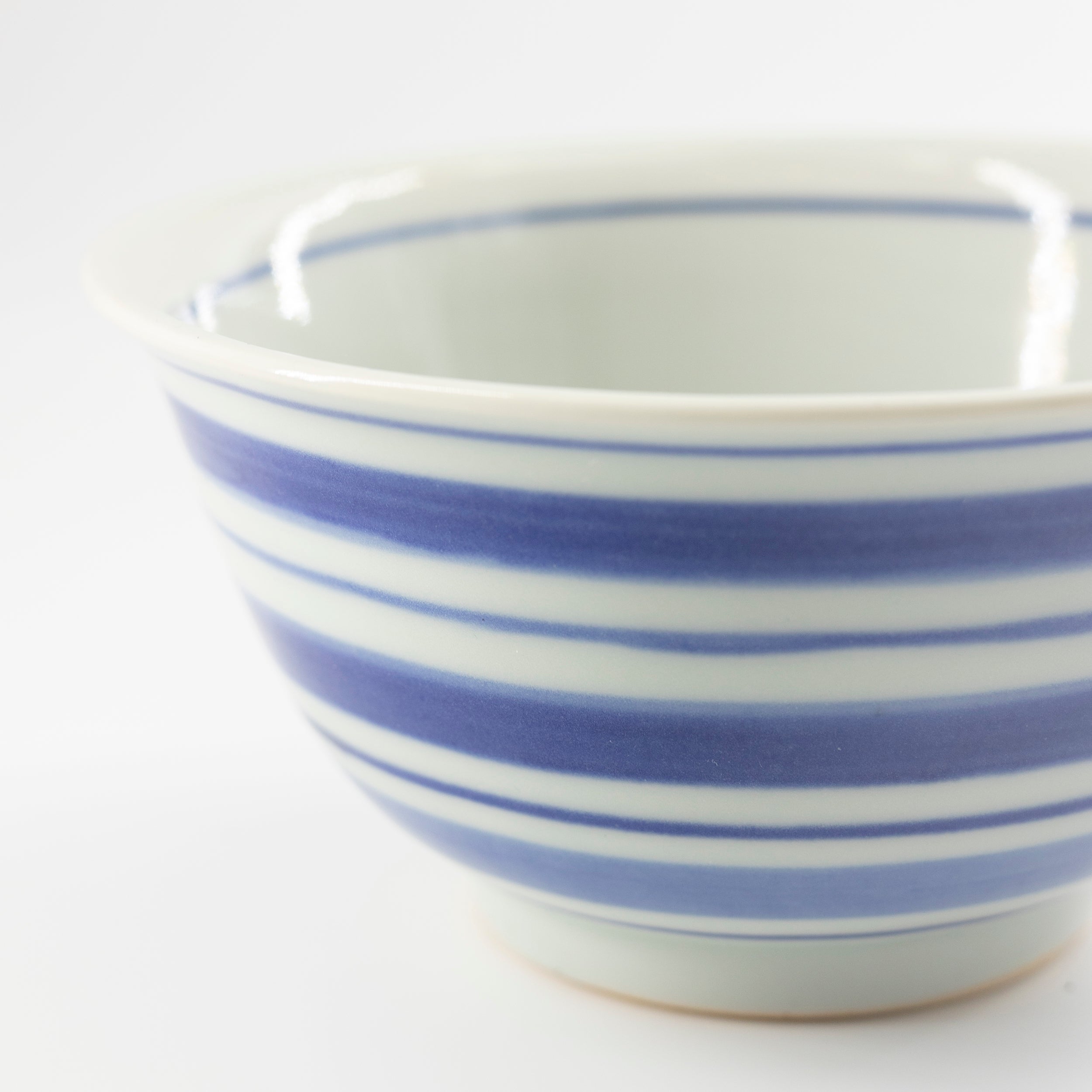 Blue and white bowl with spinning top motif