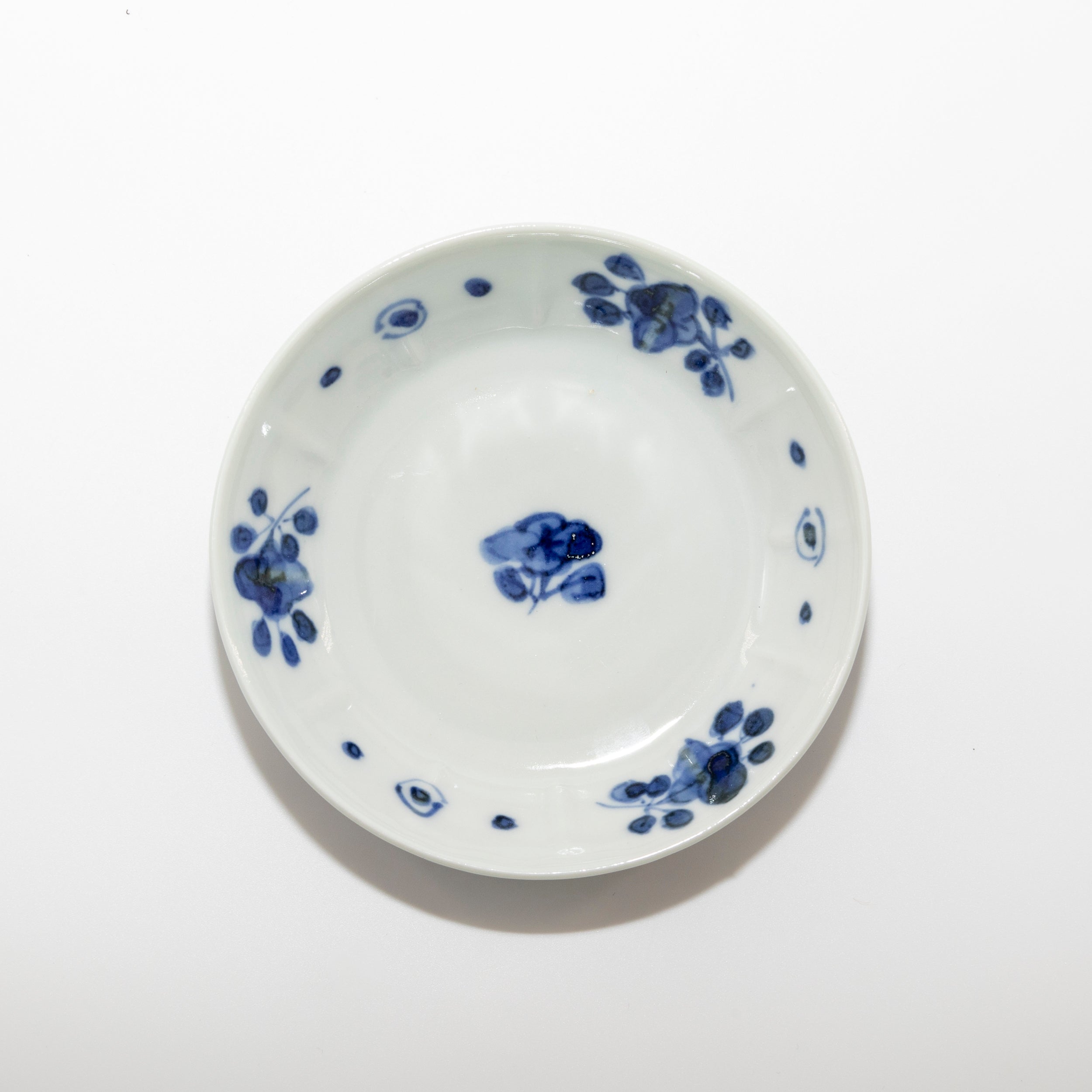 Small plate with blue and white floral motif