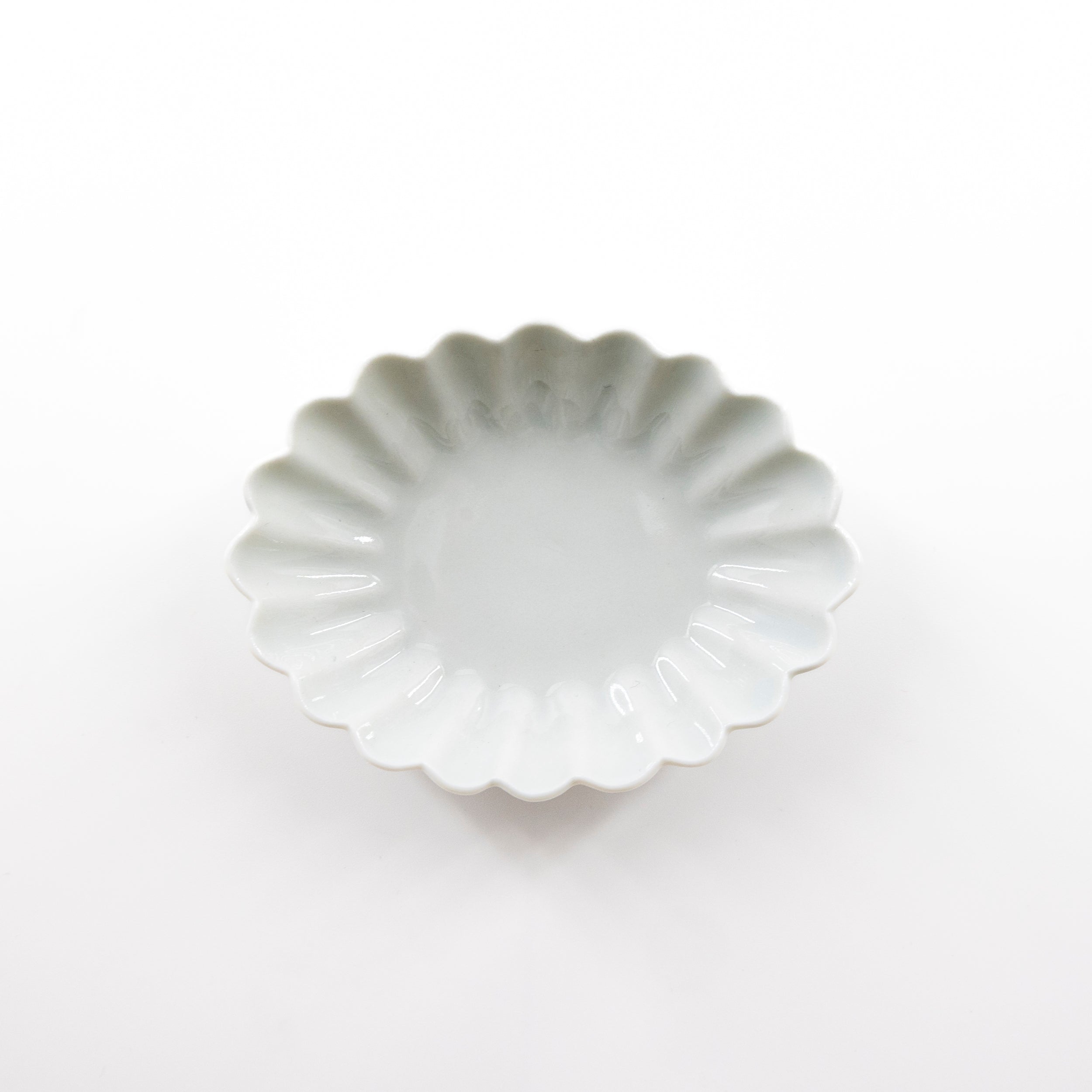 White porcelain oval flower small plate