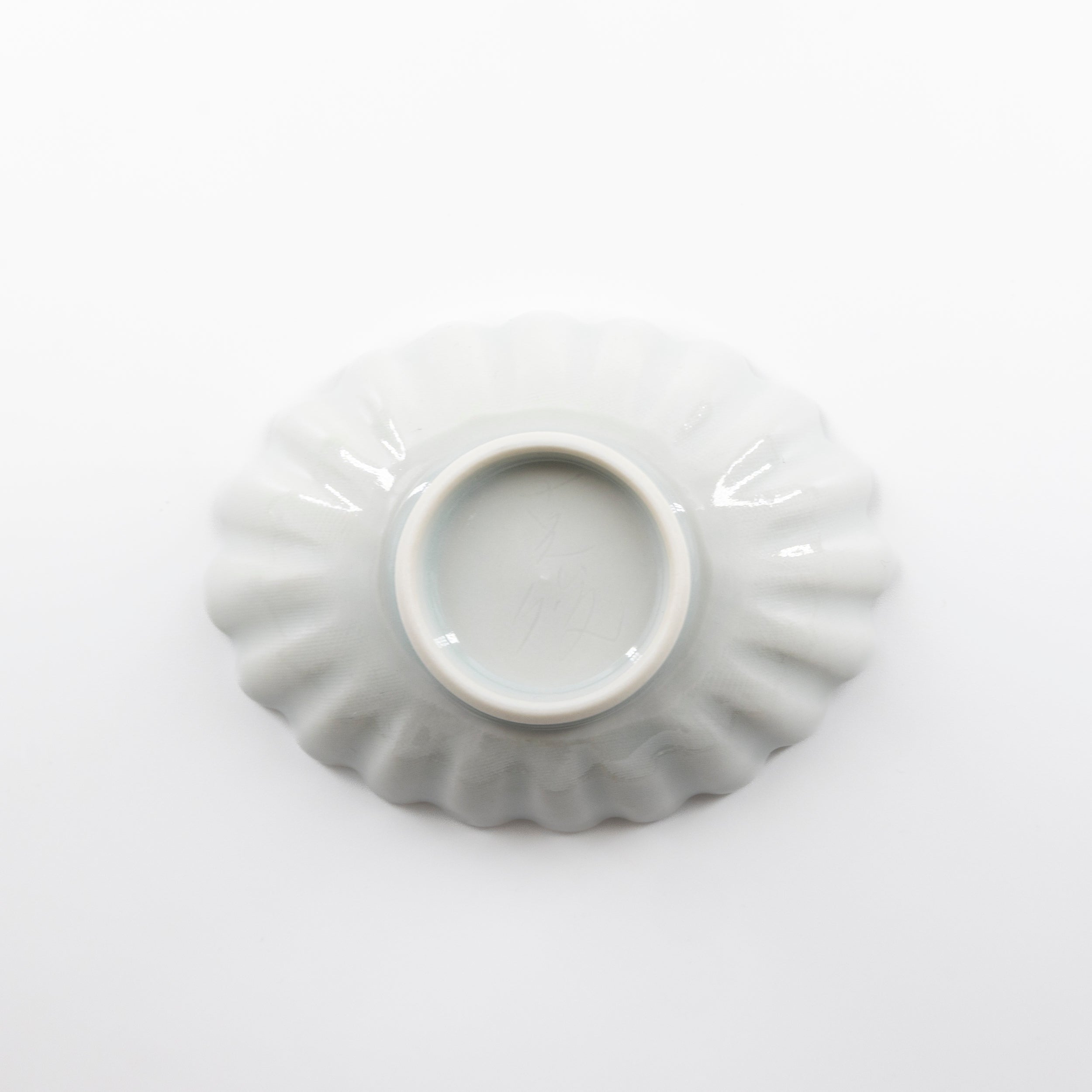 White porcelain oval flower small plate