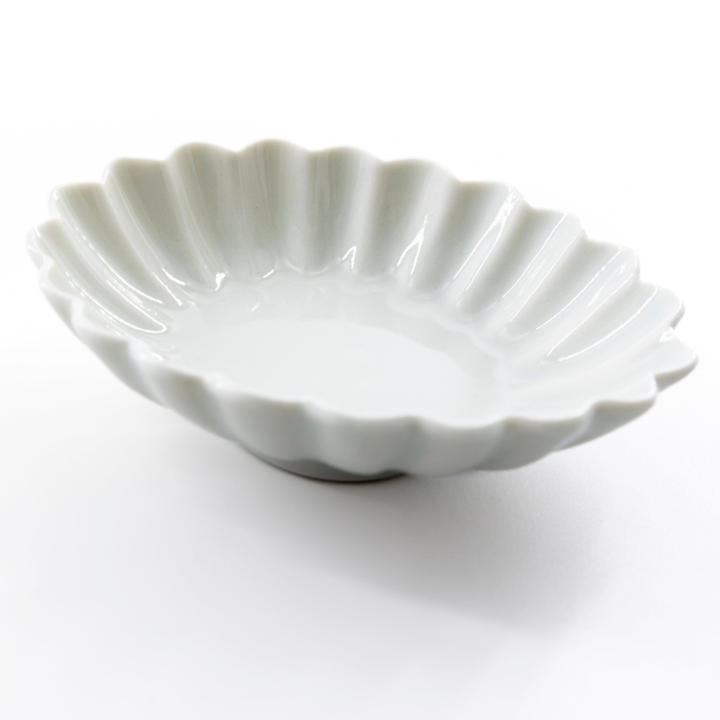 White porcelain oval flower small plate