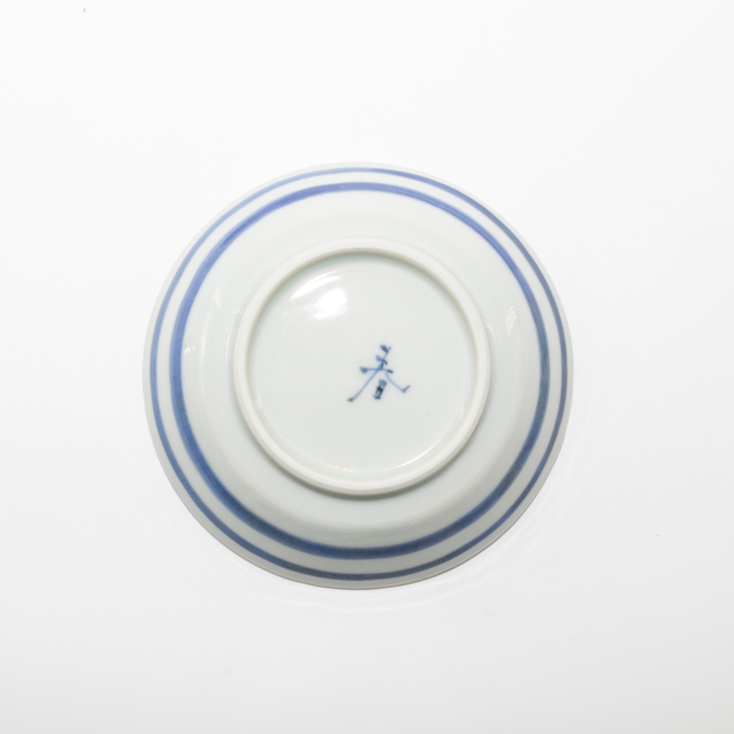 Small plate with blue and white floral motif