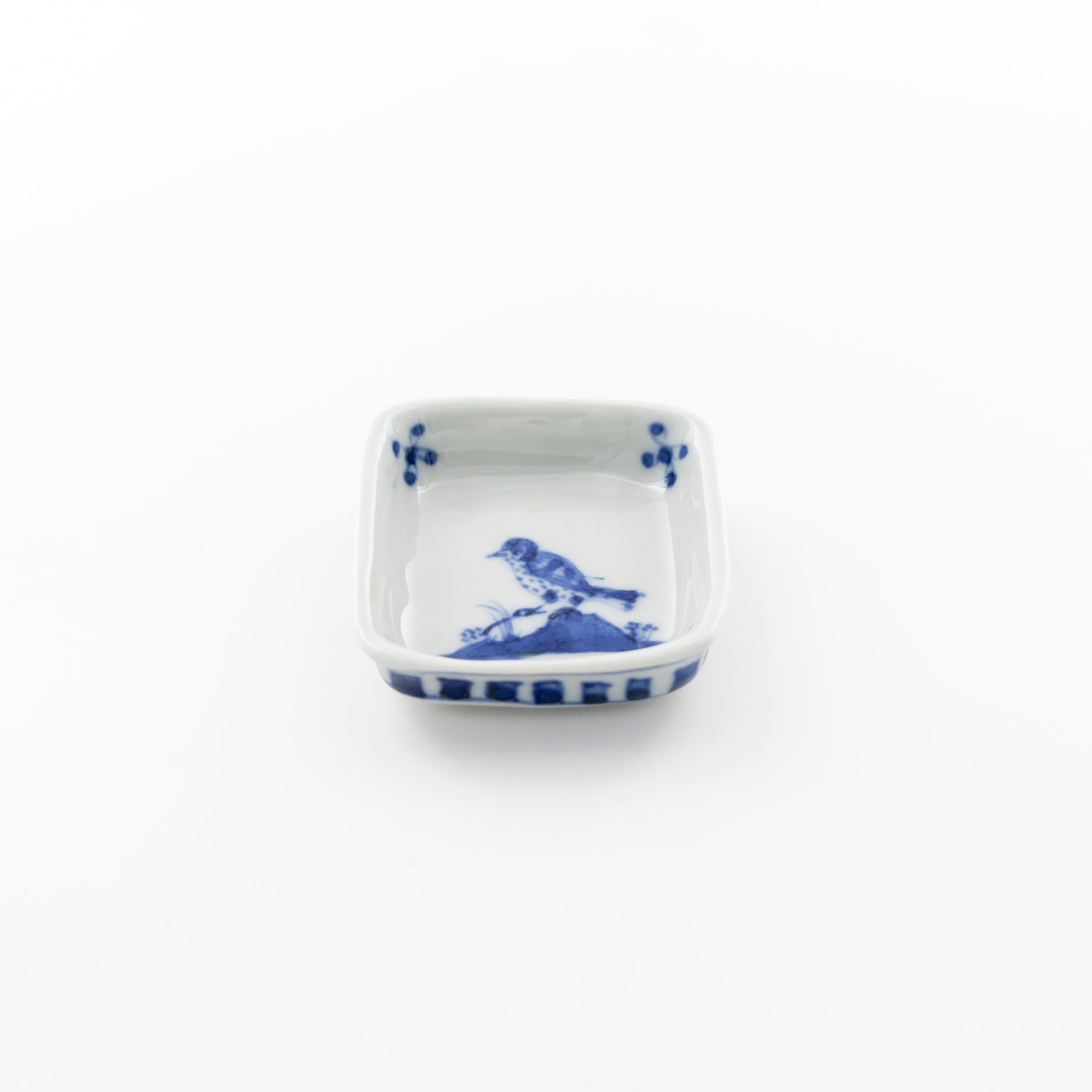 Blue and white square small dish with bird design