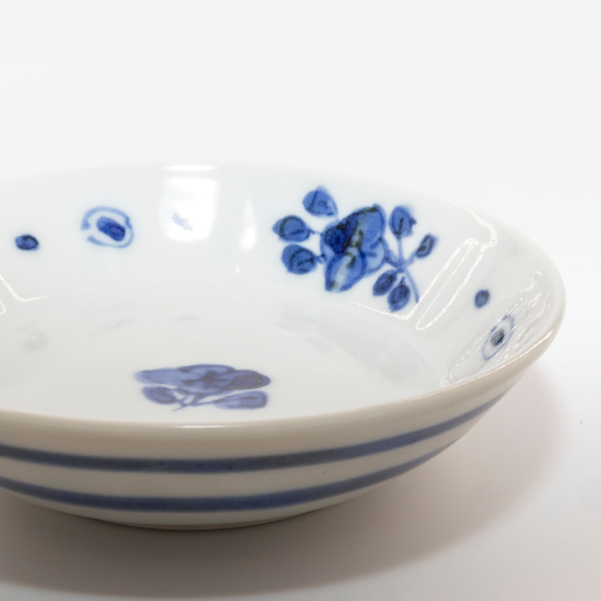 Small plate with blue and white floral motif