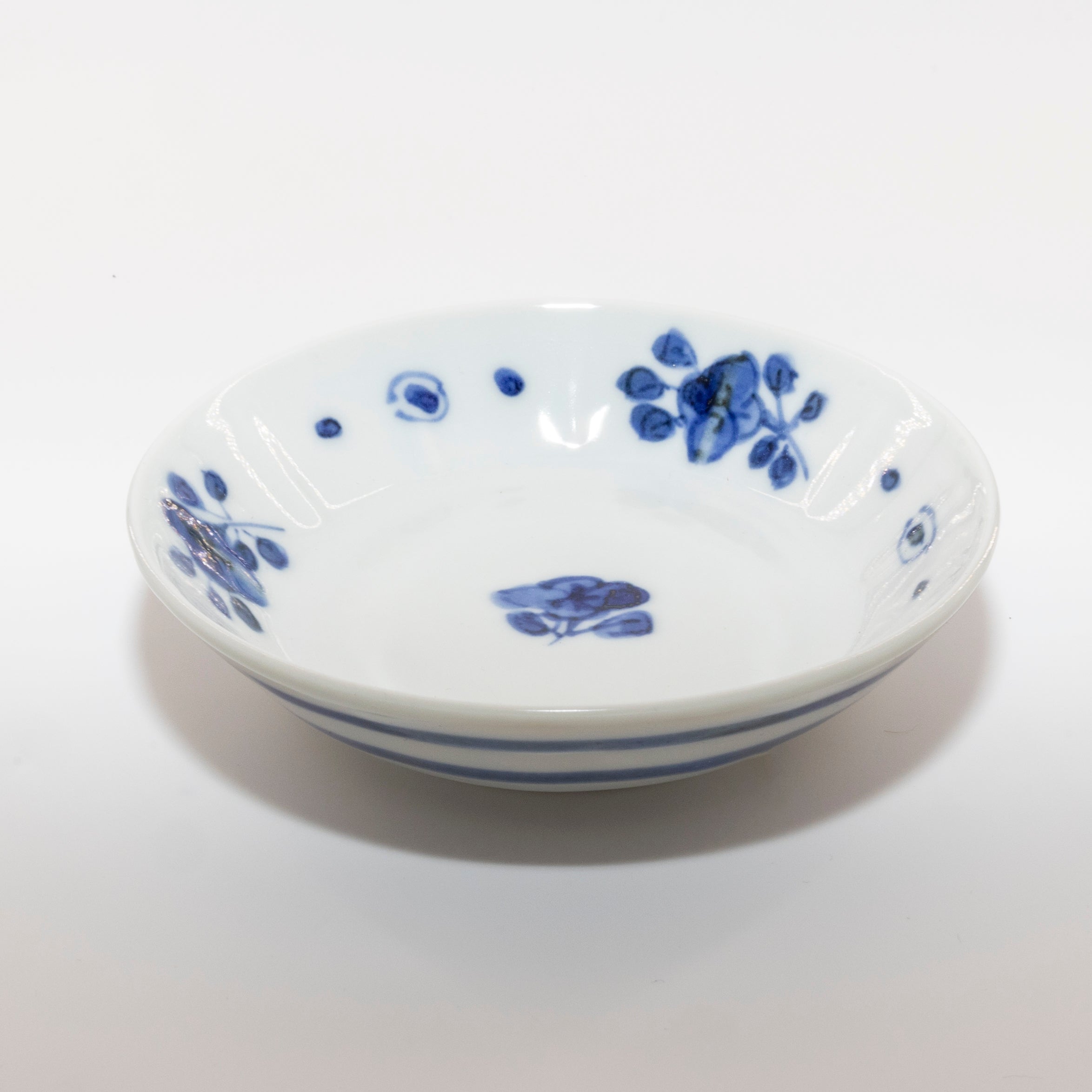 Small plate with blue and white floral motif