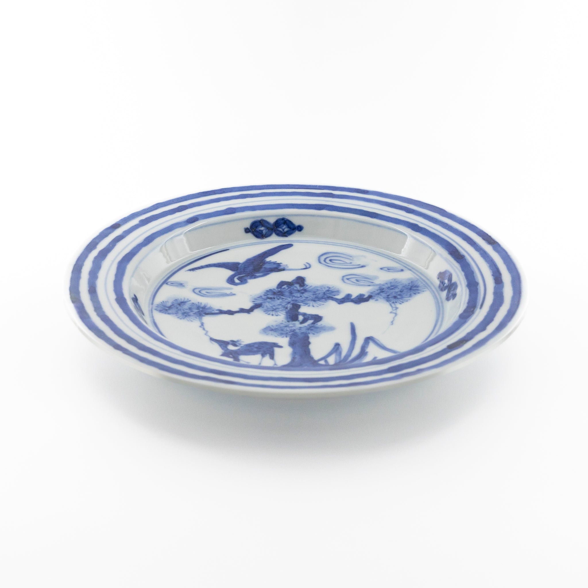 Blue and white porcelain bowl with pine, crane and deer design